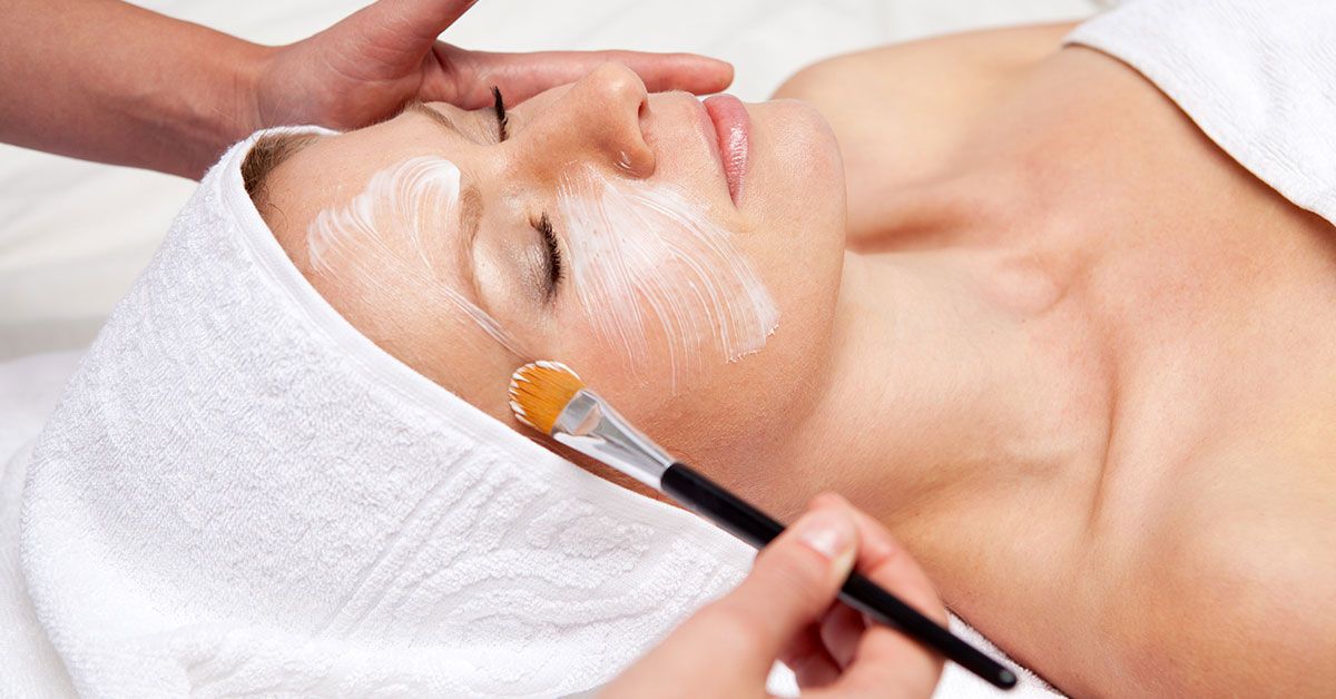 Woman receives chemical peel 