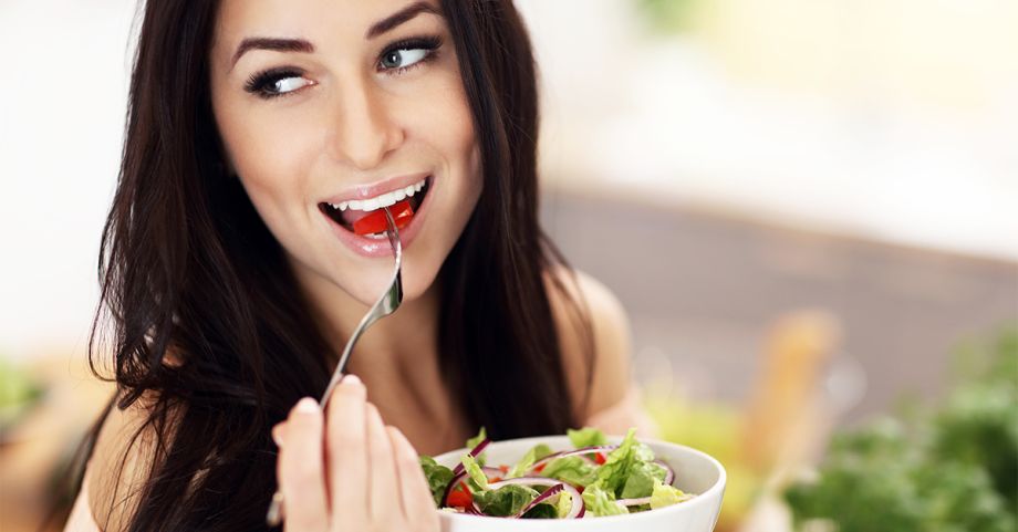 woman eating a salad, diet and hCG weight loss treatment at Tru Glo Medspa, Naples Florida